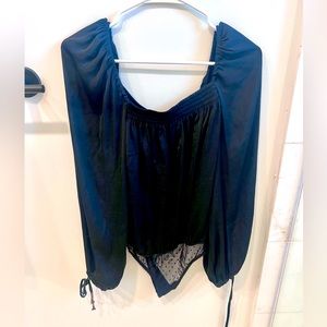 Free people long sleeve bodysuit! Super cute. Great condition
